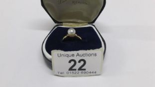An 18ct gold diamond and pearl ring,