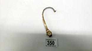 A ladies 9ct gold Accurist wrist watch on metal bracelet,
