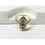 A marquis shaped 18ct gold sapphire and diamond ring,