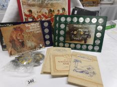 A quantity of commemorative Shell collector's medallion sets including cars, space etc,
