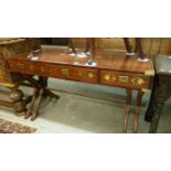 A mahogany 3 drawer side table with brass inlay