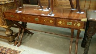 A mahogany 3 drawer side table with brass inlay