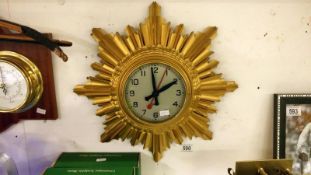 A Gent's of Leicester art deco gold painted wooden clock with electric movement