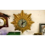 A Gent's of Leicester art deco gold painted wooden clock with electric movement