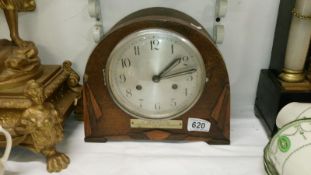 A 1930's mantel clock with pendulum
