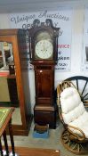 An oak cased 8 day long case clock with painted dial by T Gadsby,