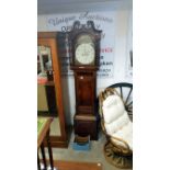 An oak cased 8 day long case clock with painted dial by T Gadsby,