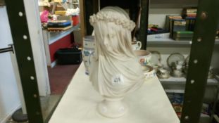 A bust of a veiled lady