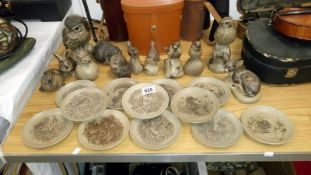 12 Poole pottery stoneware animals and 12 Poole pottery animal plates