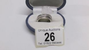 An 18ct white gold diamond and sapphire ring,