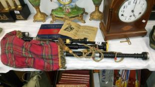 A set of bagpipes marked Macpherson, Edinburgh,