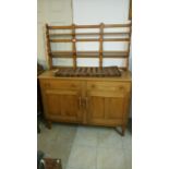 An Ercol style teak dresser