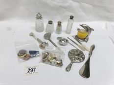 A mixed lot of silver topped bottles, an interesting caddy spoon, collar studs,
