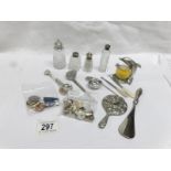 A mixed lot of silver topped bottles, an interesting caddy spoon, collar studs,