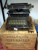 A Smith's premier typewriter with a packing crate marked Underwood