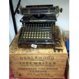 A Smith's premier typewriter with a packing crate marked Underwood