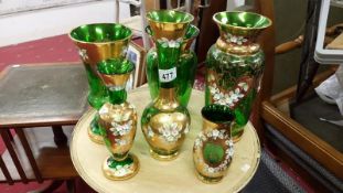 6 items of green Bohemian glass with gold and enamel decoration