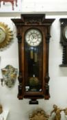 A Victorian double weight Vienna wall clock