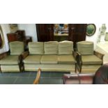 A Bergere 3 piece suite with green upholstery
