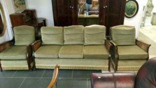 A Bergere 3 piece suite with green upholstery