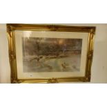 A gilt framed and glazed print of sheep in winter landscape