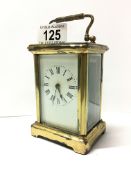 A brass carriage clock