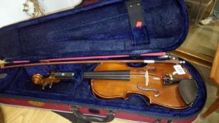 A modern violin in case