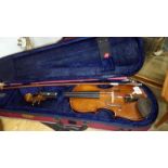 A modern violin in case