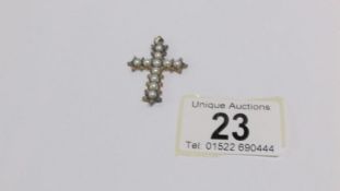 A diamond and pearl cross