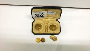 2 early coins and a pair of coin cuff links