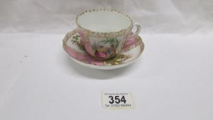 A 19th century porcelain tea cup and saucer with crown over letter S mark