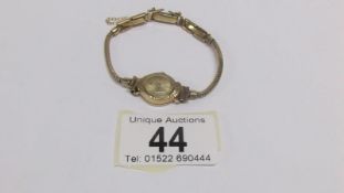 A ladies gold Accurist wrist watch