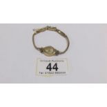 A ladies gold Accurist wrist watch