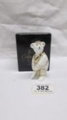 A boxed Royal Crown Derby cricketer figure