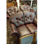 A good quality brown leather 3 piece suite comprising 2 seat sofa and 2 chairs