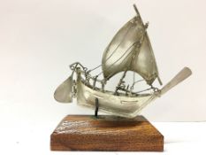 An unmarked continental silver model of a sailing boat