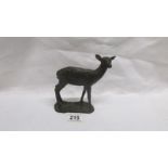 A bronze hand worked deer,