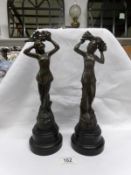 A pair of art deco spelter female figures