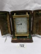 A brass carriage clock in original case