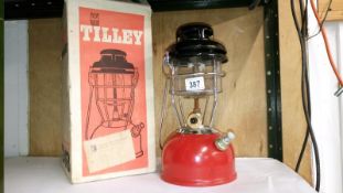 A boxed Tilley X236B stormlight pressure lantern