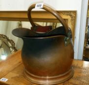 A good Edwardian copper coal scuttle