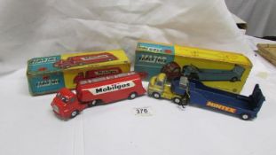 A boxed Corgi 1100 'Carrimore' low loader and a boxed 1110 Mobilgas petrol tanker