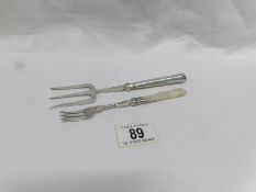 2 silver pickle forks