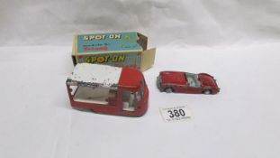 A boxed Spot-on United Daires milk float and an unboxed MGA,