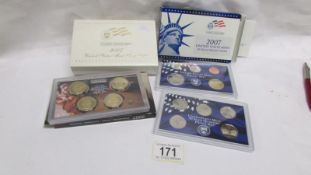 A United States mint proof set of 14 coins including $1,