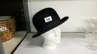 A bowler hat by R. Dry, Lincoln, inner circumference approximately 22.25" / 56.