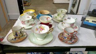 9 various tea cups and saucers