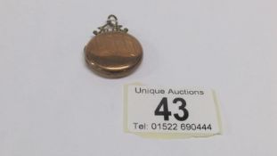 A 9ct gold locket