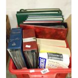 A quantity of stamp albums and stamp catalogues