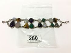 A silver 1970's bracelet of semi precious stones